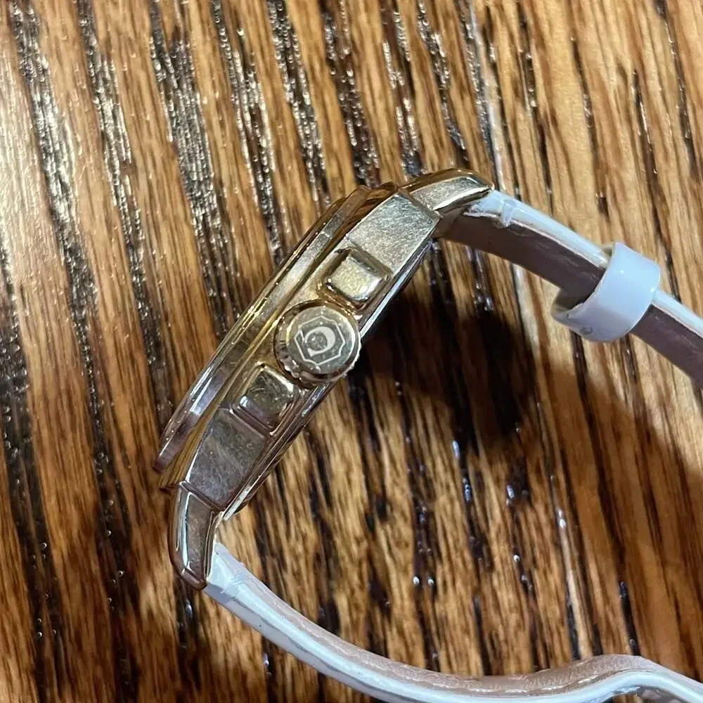 Coach Boyfriend Gold Tone Crystal Bezel Watch with White Strap